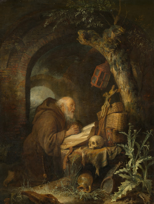 Old bearded man kneels in prayer before a crucifix in a shadowy, brick-arched grotto.